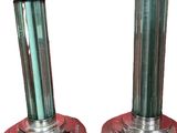 pair of silver and green candlesticks on red bases