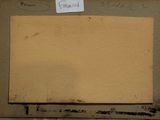 an old picture of a piece of cardboard with a note attached to it