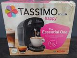 un coffret contenant une machine à café Tassimo Happy Espresso