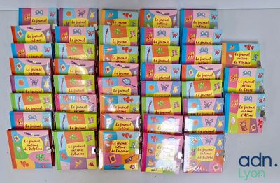 a lot of children ' s books on the table