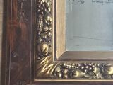 a picture of a picture of a mirror on the wall