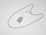 a gold chain with a price tag attached to it