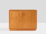 an image of a wooden cabinet with two doors and two drawers