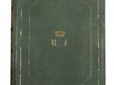 a green book with gold lettering on it and a white background
