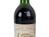 a bottle of wine that is sitting on a table