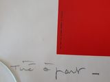 a piece of paper with writing on it next to a fork and knife