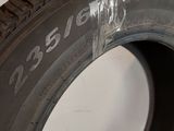 a tire with a sticker on the side of it