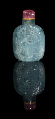 an image of a blue glass bottle with a pink lid