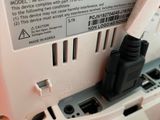 a close up of an electronic device that is on the wall