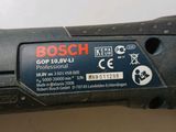 the bosch cordless drill is being used to drill a hole in the wall