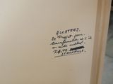 a close up of a piece of paper with writing on it
