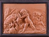 an image of a relief of a man wrestling with a dog