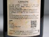 a label on a bottle of wine on a table