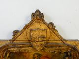 une image d'un tableau sur le mur d'une pièce