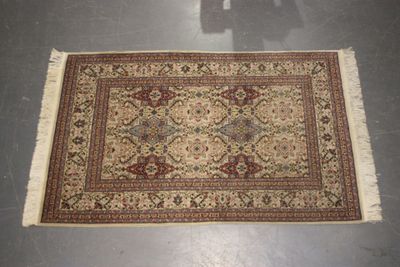 rug on the floor with a shadow of a person in the background