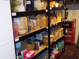 many shelves of food in a room with a red ladder