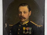 portrait d'un homme en uniforme militaire, avec des médailles sur la poitrine