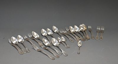 eight silverplated spoons and forks arranged in a row on a gray surface