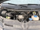 the engine of a car with its hood open and the hood open