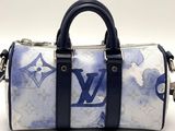 louis vu vu blue and white floral print leather handbag