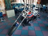 a motorcycle that is parked in a restaurant