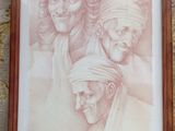 tableau représentant trois hommes portant un foulard, accroché au mur