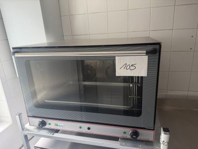 a toaster oven that is sitting on top of a shelf