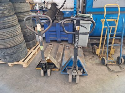 a dolly with a tire on it in a garage