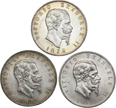 trois pièces d'argent sur lesquelles figurent les portraits d'un homme et d'une femme