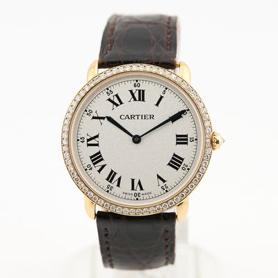 Montre-bracelet Cartier pour femme, en or 18 carats et sertie de diamants