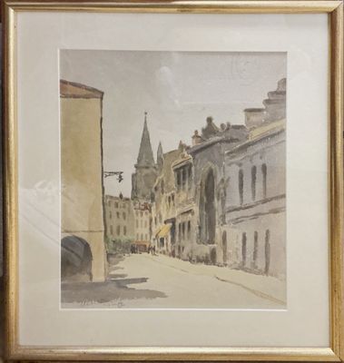 framed watercolor painting of a street scene with buildings and a clock tower
