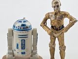 star wars figurines of r2 - d2 and c - 3po