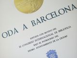 a close up of a book with a gold medal on it