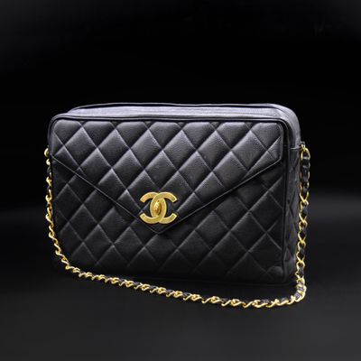 a chanel black quilted leather shoulder bag with gold hardware