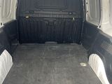 the back end of a van with its cargo door open