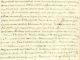 lettre manuscrite écrite à l'encre noire sur une feuille de papier