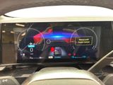 a picture of a car dashboard with a display on it