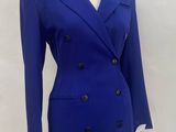 a close up of a blue suit on a mannequin mannequin