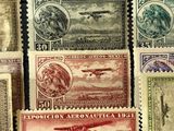 several different types of stamps are displayed in a display case