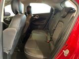 a red car with black seats in the back of it