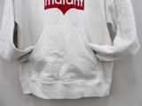 white hoodie with a red logo on the front and a red heart on the back