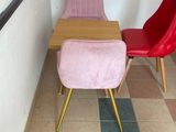 two chairs sitting next to each other in a room