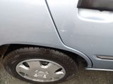 a car that has a flat tire on the road