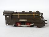a toy train that is sitting on a white surface