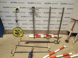 a lot of tools that are laying out on the floor