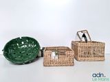 three baskets that are sitting next to each other on a table