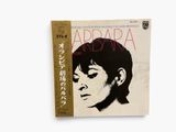 a book with a picture of a woman ' s face on it