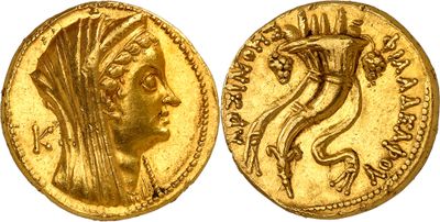 a gold coin with an image of a woman ' s head on it