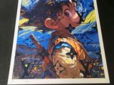 a picture of a framed picture of a young boy with a hat on