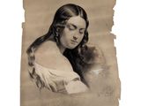 une vieille photo d'une femme aux cheveux longs tenant un chat dans ses bras